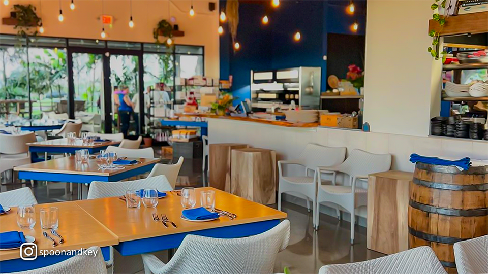 Interior view of Spoon & Key Market, showing the seating area and serving counter with a welcoming, open layout.