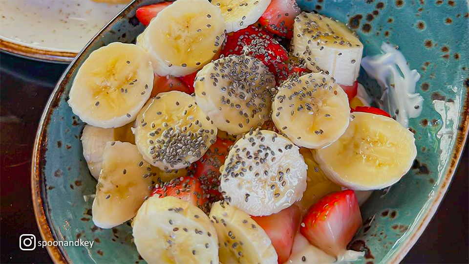 Delicious banana and strawberry dish at Spoon & Key Market in Wailea, Maui, served with fresh fruits and artistic plating.