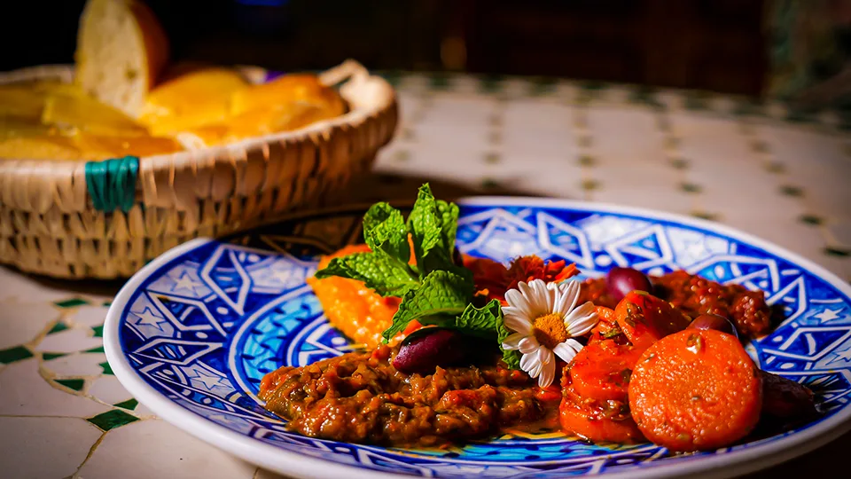 Close-up of an artfully plated Moroccan-inspired dish at Le Bazaar Maui.