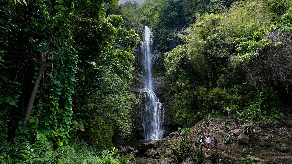 Wailua Falls most photographed Maui waterfall 80-foot cascade visible from Road to Hana Mile Marker 45 with swimming pool