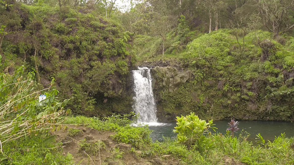 Two-tiered Pua'a Ka'a Falls with 15-foot upper and 25-foot lower cascades Road to Hana