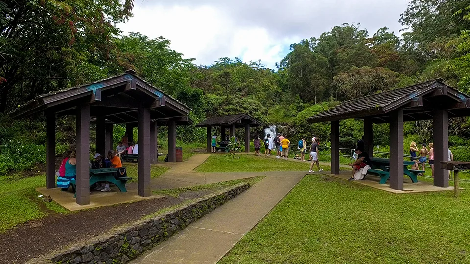 Covered picnic tables and facilities at Pua'a Ka'a State Wayside Park Maui waterfall stop