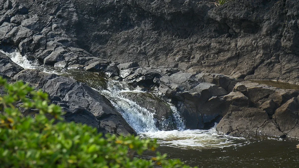 Rocky cascades at 'Ohe'o Gulch Seven Sacred Pools with volcanic rock formations in Kipahulu Maui