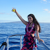 A woman stands on the deck of the Pride of Maui vessel