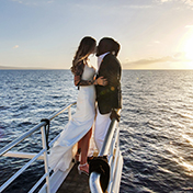 A married couple on the deck of the Pride of Maui