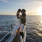 A married couple on the deck of the Pride of Maui