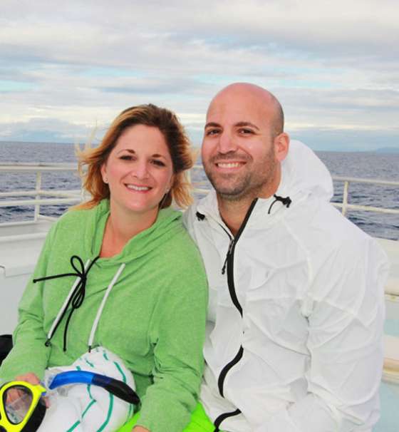 A couple on the deck of a ship