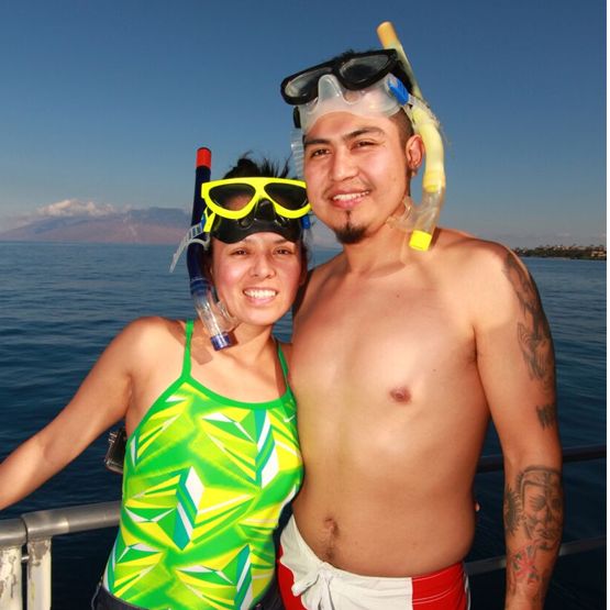 A couple on the deck of Pride of Maui